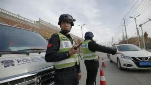 Contrôle d’identité par la police, xinjiang Chine
